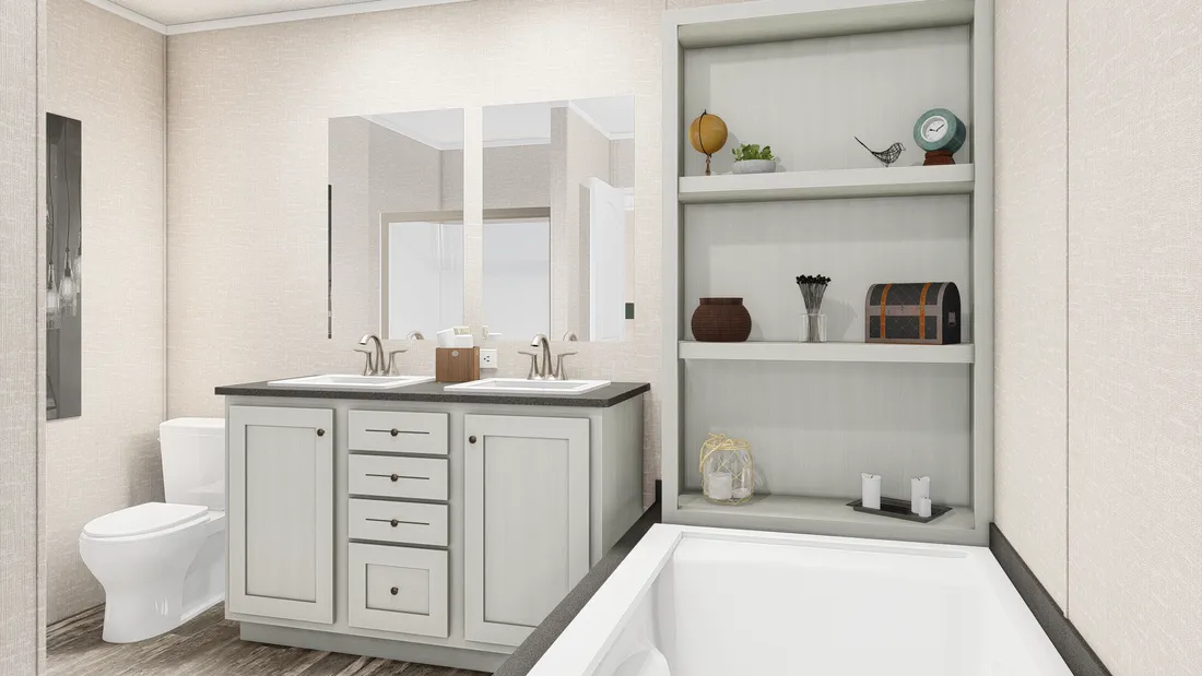 The THE ANNIVERSARY PLUS Primary Bathroom. This Manufactured Mobile Home features 3 bedrooms and 2 baths.