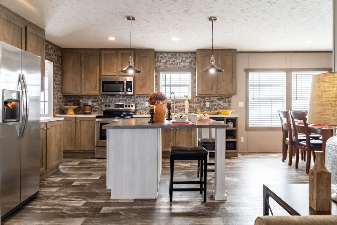 The ULTRA EXCEL 4 BR 28X60 Kitchen. This Manufactured Mobile Home features 4 bedrooms and 2 baths.
