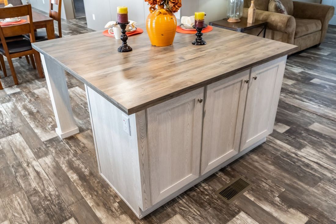 The ULTRA EXCEL 4 BR 28X60 Kitchen. This Manufactured Mobile Home features 4 bedrooms and 2 baths.