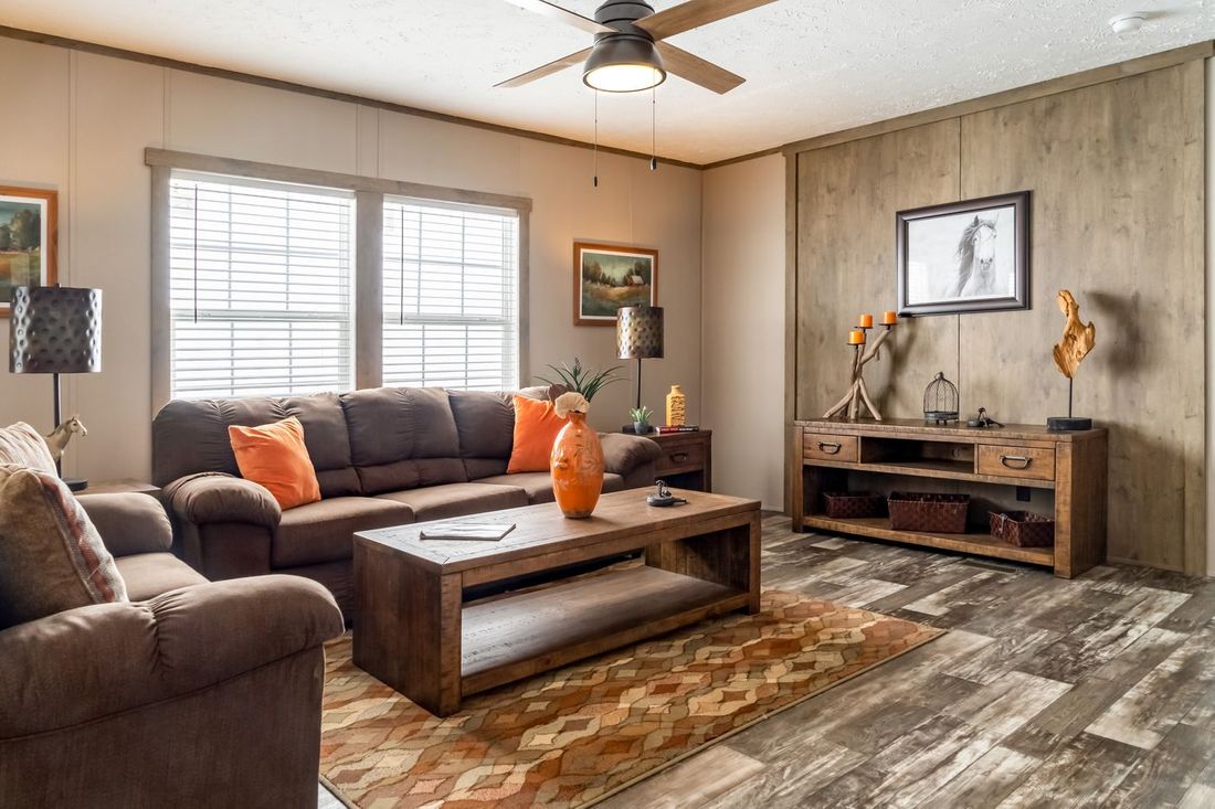 The ULTRA EXCEL 4 BR 28X60 Living Room. This Manufactured Mobile Home features 4 bedrooms and 2 baths.
