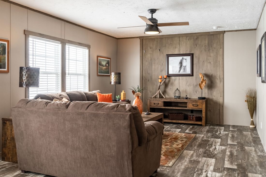 The ULTRA EXCEL 3 BR 28X60 Living Room. This Manufactured Mobile Home features 3 bedrooms and 2 baths.