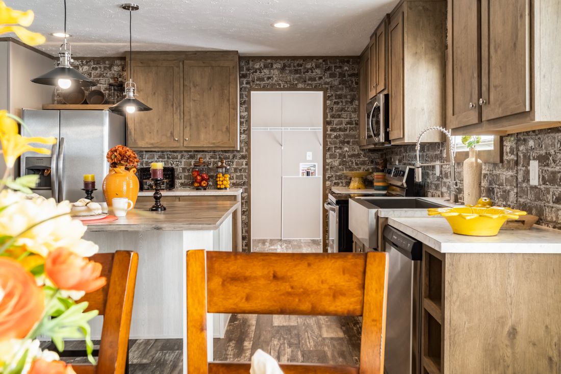 The ULTRA EXCEL 3 BR 28X60 Kitchen. This Manufactured Mobile Home features 3 bedrooms and 2 baths.