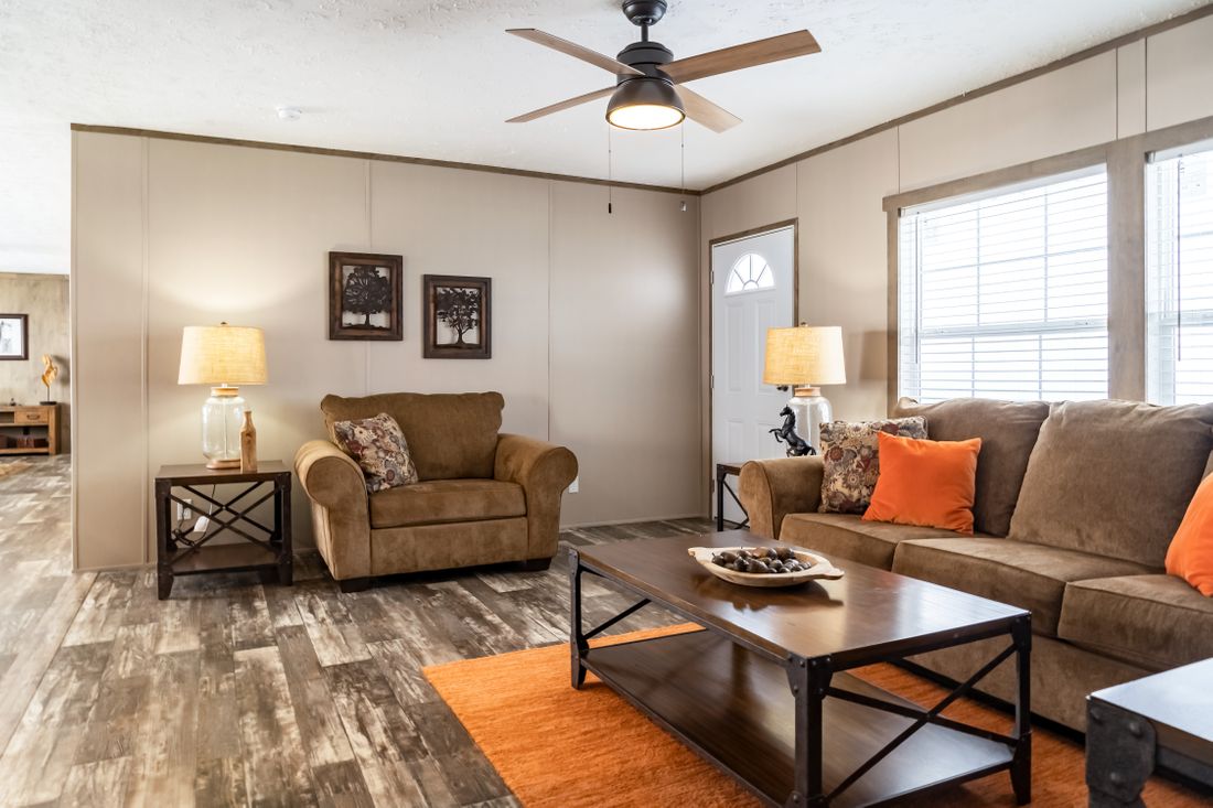 The ULTRA EXCEL 3 BR 28X60 Living Room. This Manufactured Mobile Home features 3 bedrooms and 2 baths.