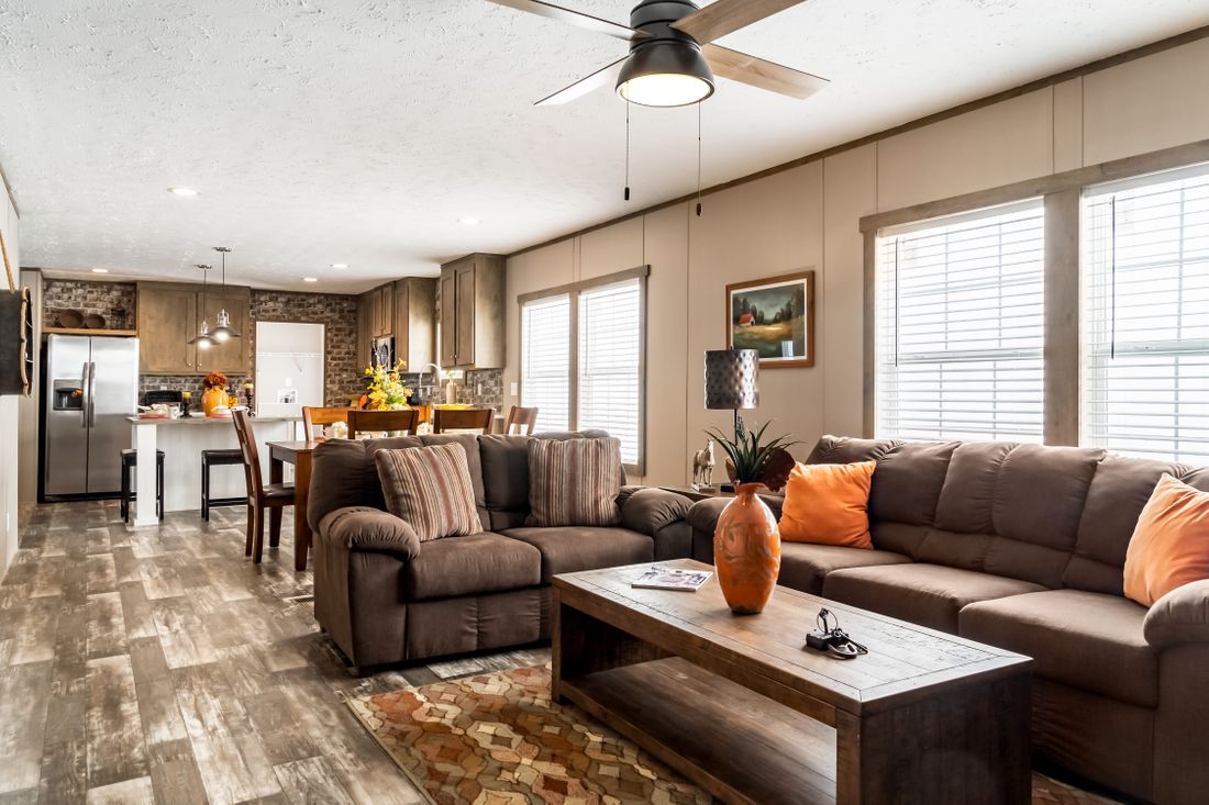 The ULTRA EXCEL 3 BR 28X60 Living Room. This Manufactured Mobile Home features 3 bedrooms and 2 baths.