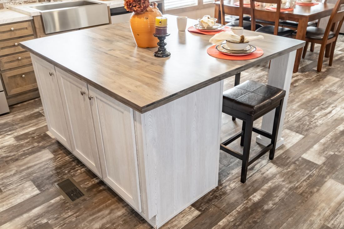 The ULTRA EXCEL 3 BR 28X60 Kitchen. This Manufactured Mobile Home features 3 bedrooms and 2 baths.