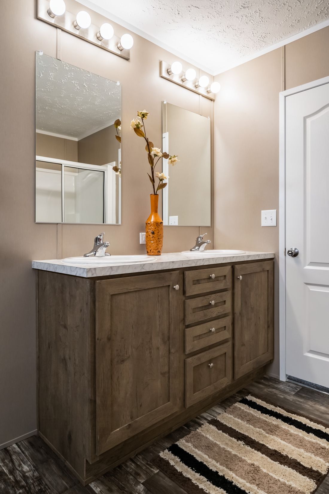 The ULTRA EXCEL 3 BR 28X60 Primary Bathroom. This Manufactured Mobile Home features 3 bedrooms and 2 baths.