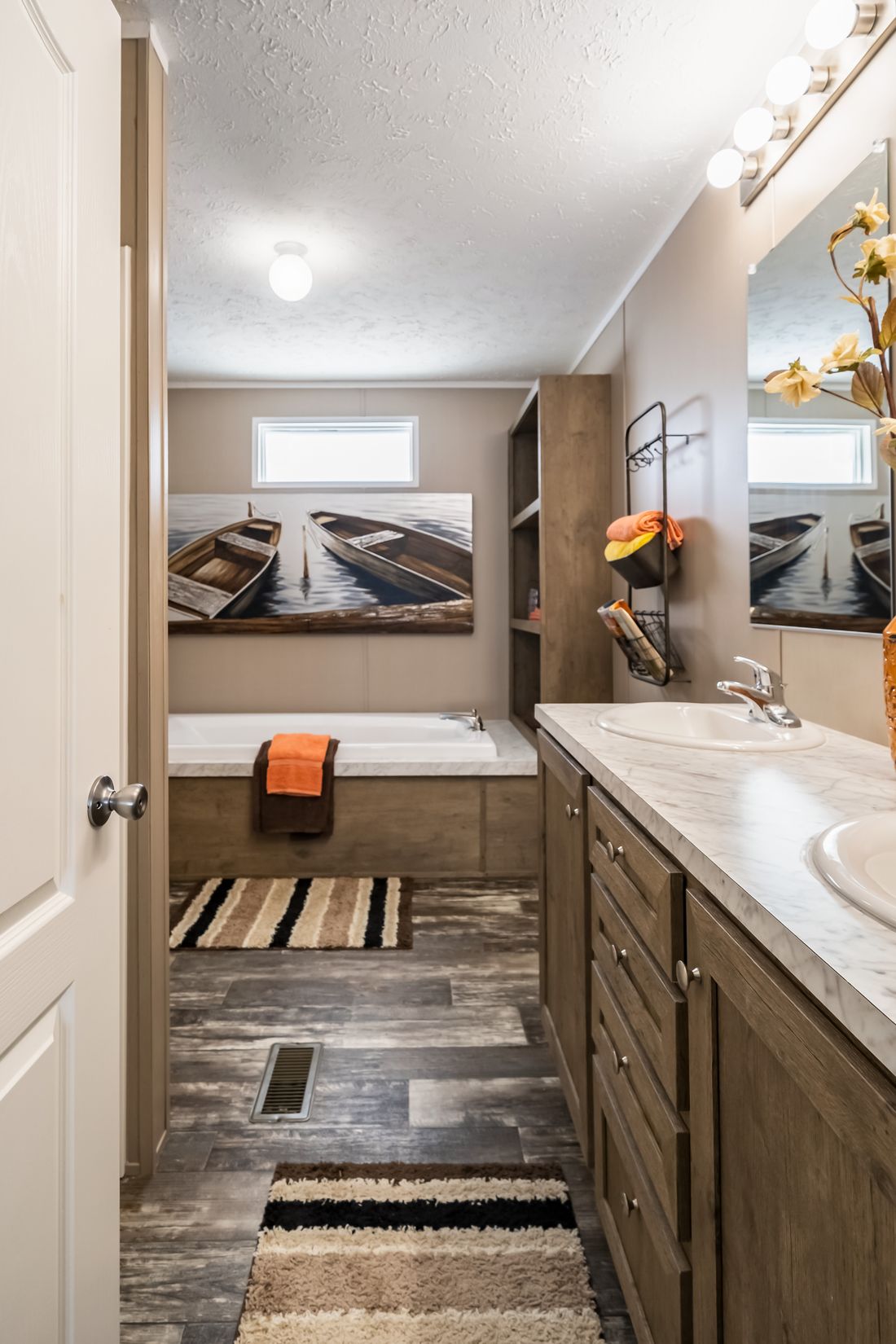 The ULTRA EXCEL 3 BR 28X60 Primary Bathroom. This Manufactured Mobile Home features 3 bedrooms and 2 baths.