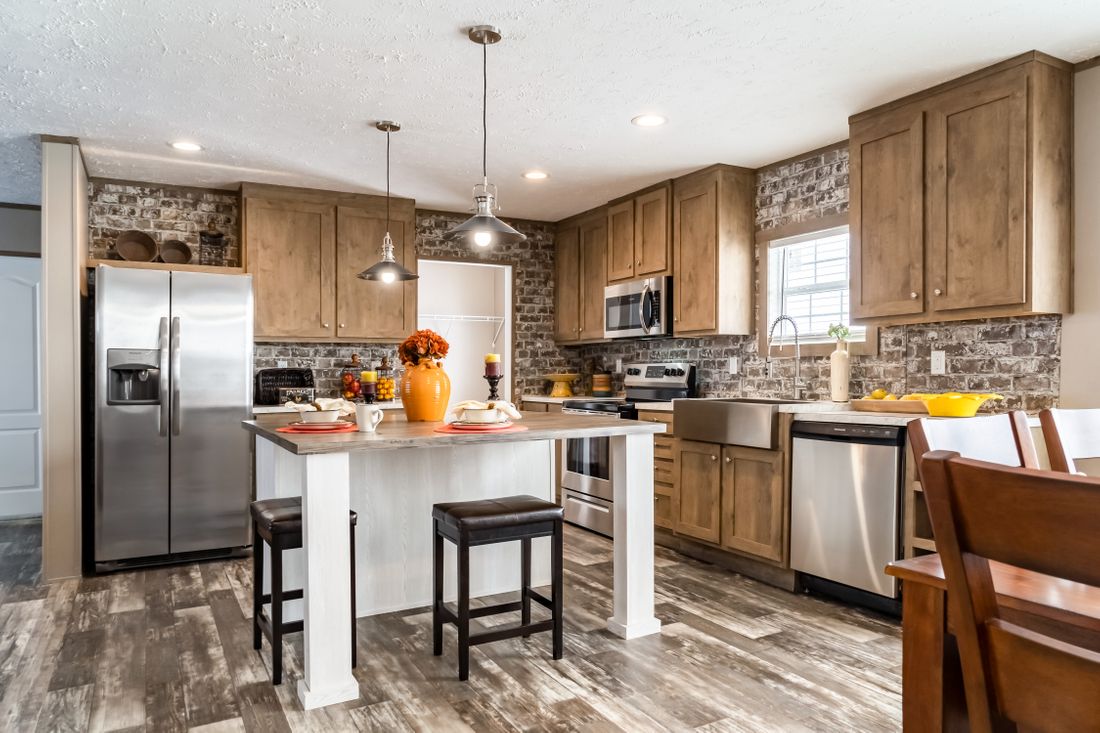 The ULTRA EXCEL 3 BR 28X60 Kitchen. This Manufactured Mobile Home features 3 bedrooms and 2 baths.