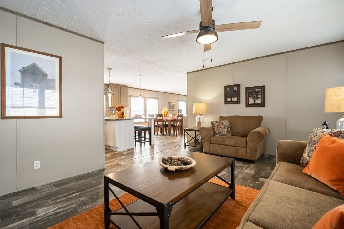 The ULTRA EXCEL 3 BR 28X60 Living Room. This Manufactured Mobile Home features 3 bedrooms and 2 baths.