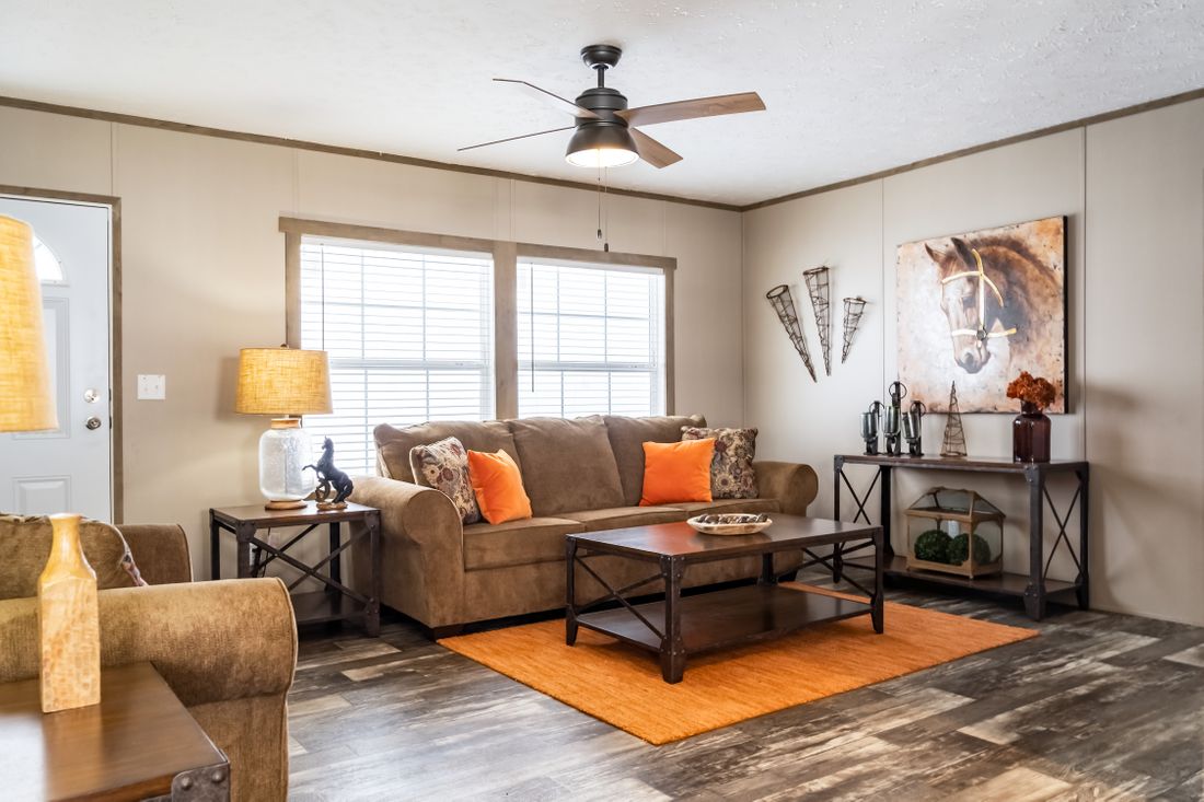 The ULTRA EXCEL 3 BR 28X60 Living Room. This Manufactured Mobile Home features 3 bedrooms and 2 baths.