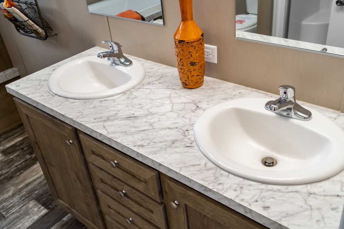 The ULTRA EXCEL 3 BR 28X60 Primary Bathroom. This Manufactured Mobile Home features 3 bedrooms and 2 baths.