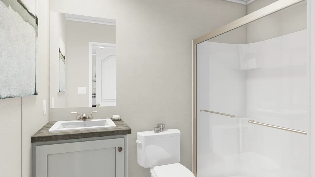 The ULTRA PRO 16X64 Primary Bathroom. This Manufactured Mobile Home features 3 bedrooms and 2 baths.