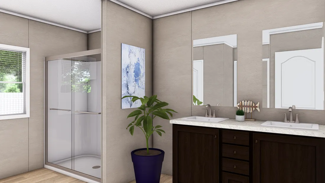 The ULTRA BREEZE 28X76 Primary Bathroom. This Manufactured Mobile Home features 4 bedrooms and 2 baths.