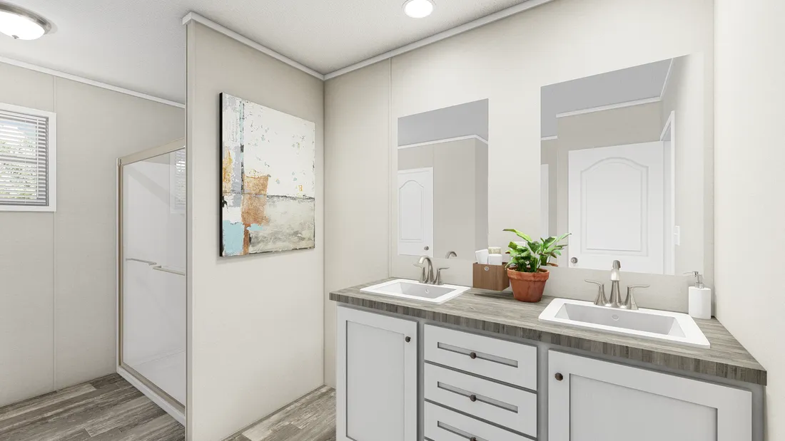 The ULTRA BREEZE 28X52 Primary Bathroom. This Manufactured Mobile Home features 3 bedrooms and 2 baths.