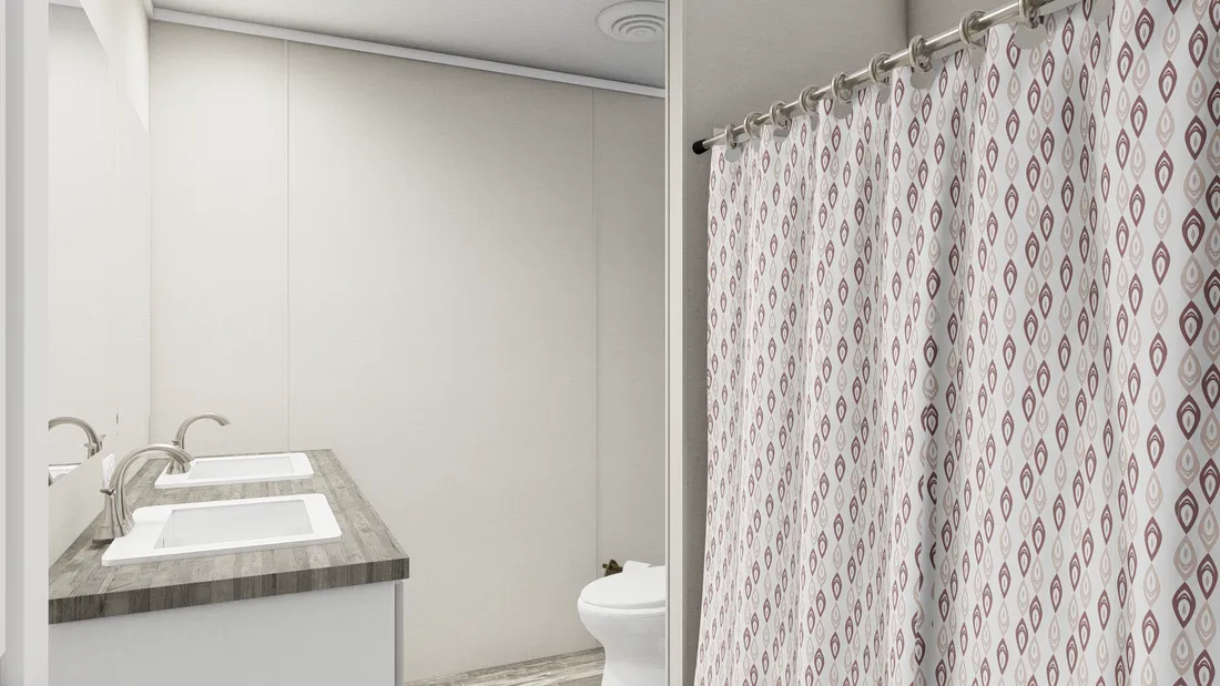 The ULTRA BREEZE 28X52 Guest Bathroom. This Manufactured Mobile Home features 3 bedrooms and 2 baths.