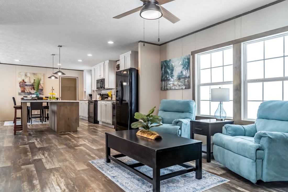 The ULTRA EXCEL 3 BR 28X56 Family Room. This Manufactured Mobile Home features 3 bedrooms and 2 baths.
