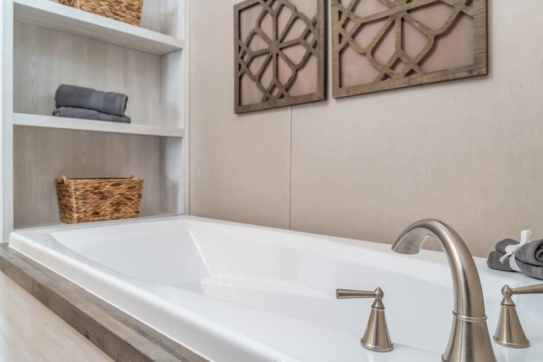 The ULTRA EXCEL 3 BR 28X56 Primary Bathroom. This Manufactured Mobile Home features 3 bedrooms and 2 baths.