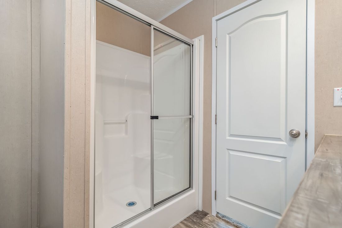 The ULTRA EXCEL 3 BR 28X56 Primary Bathroom. This Manufactured Mobile Home features 3 bedrooms and 2 baths.