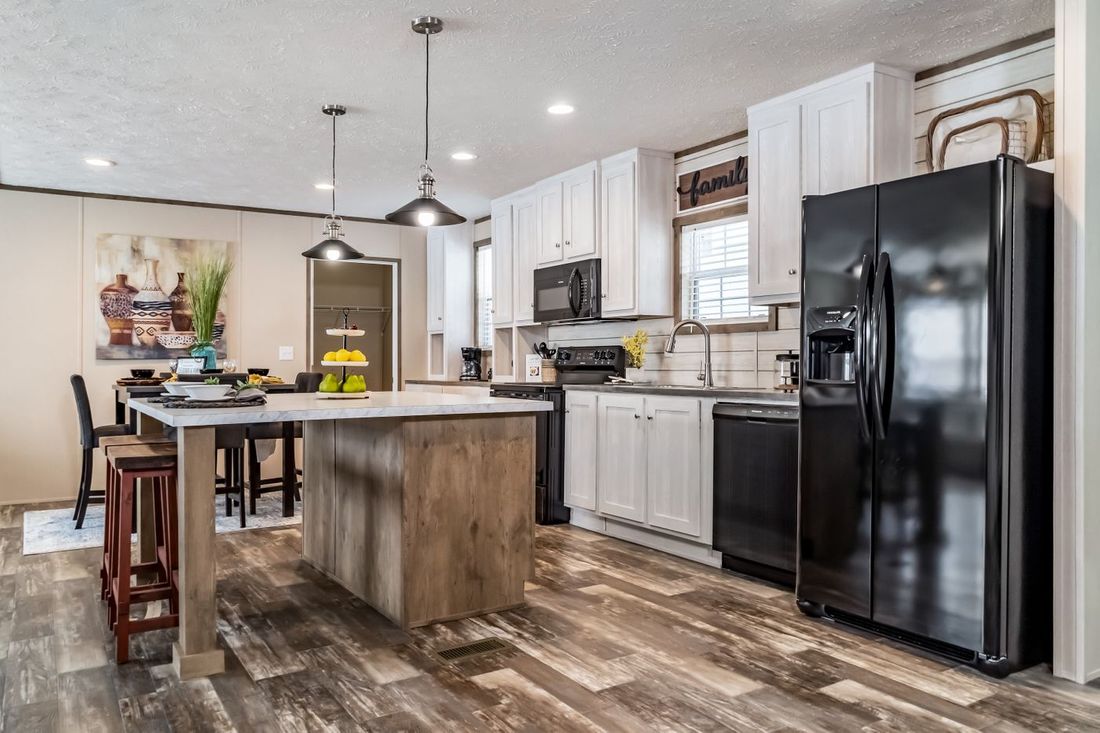 The ULTRA EXCEL 3 BR 28X56 Kitchen. This Manufactured Mobile Home features 3 bedrooms and 2 baths.