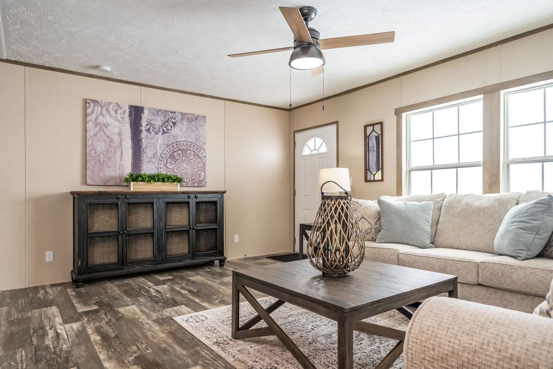 The ULTRA EXCEL 3 BR 28X56 Living Room. This Manufactured Mobile Home features 3 bedrooms and 2 baths.