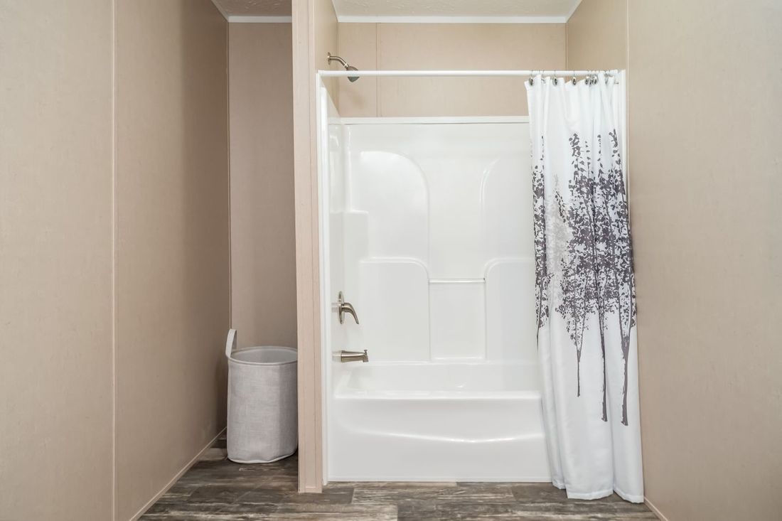 The ULTRA EXCEL 3 BR 28X56 Guest Bathroom. This Manufactured Mobile Home features 3 bedrooms and 2 baths.