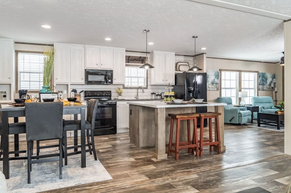 The ULTRA EXCEL 3 BR 28X56 Kitchen. This Manufactured Mobile Home features 3 bedrooms and 2 baths.