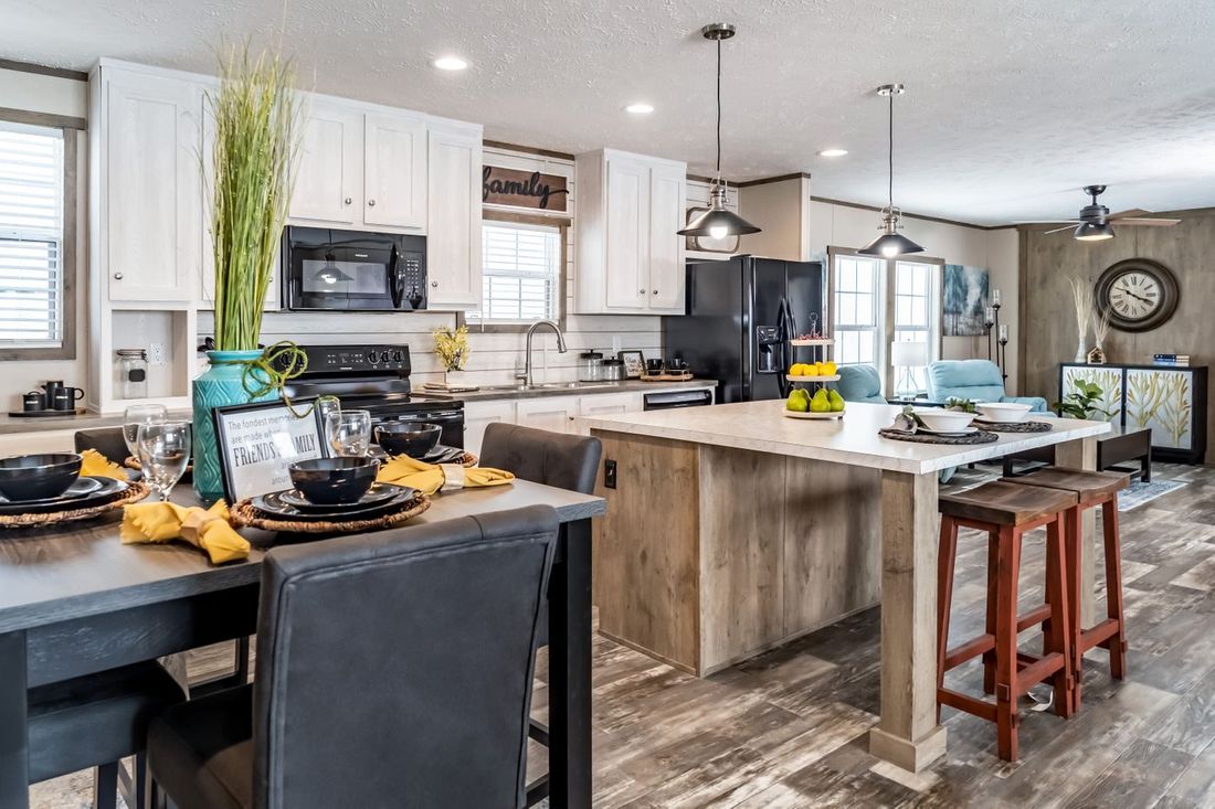 The ULTRA EXCEL 3 BR 28X56 Kitchen. This Manufactured Mobile Home features 3 bedrooms and 2 baths.