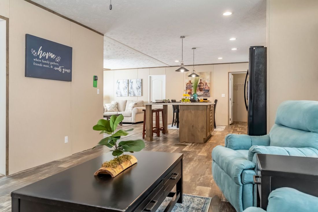 The ULTRA EXCEL 3 BR 28X56 Family Room. This Manufactured Mobile Home features 3 bedrooms and 2 baths.