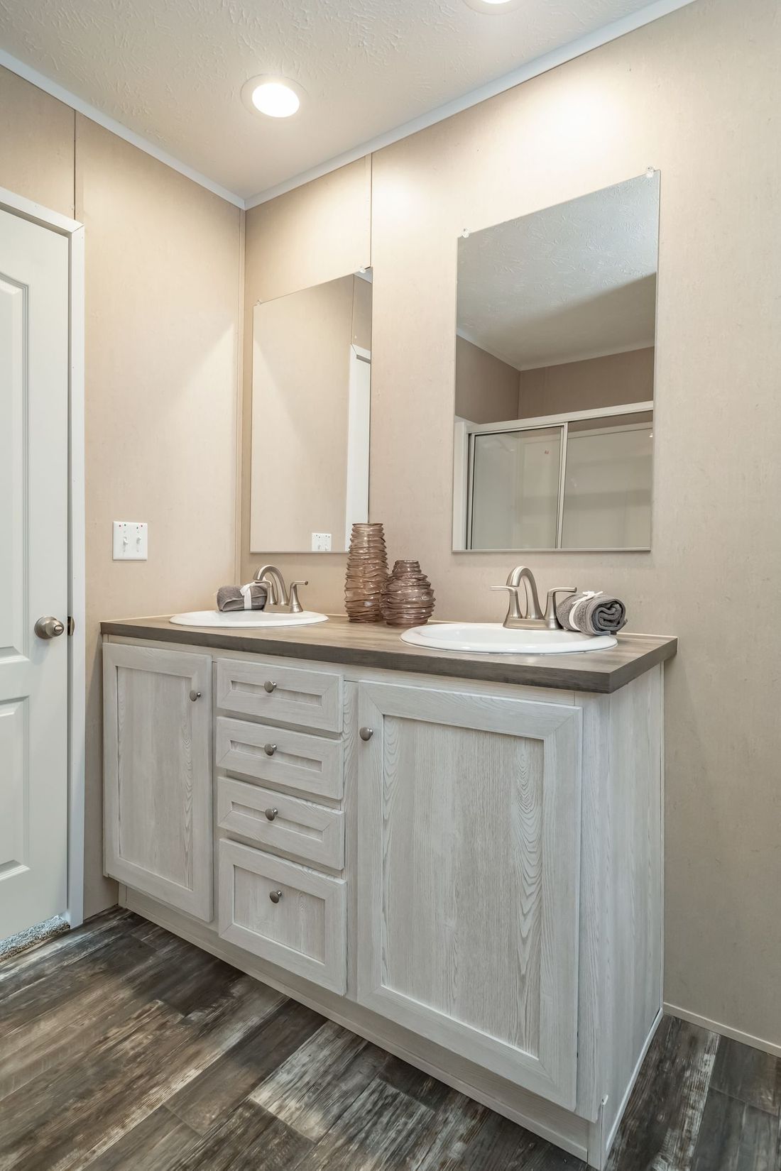 The ULTRA EXCEL 3 BR 28X56 Primary Bathroom. This Manufactured Mobile Home features 3 bedrooms and 2 baths.