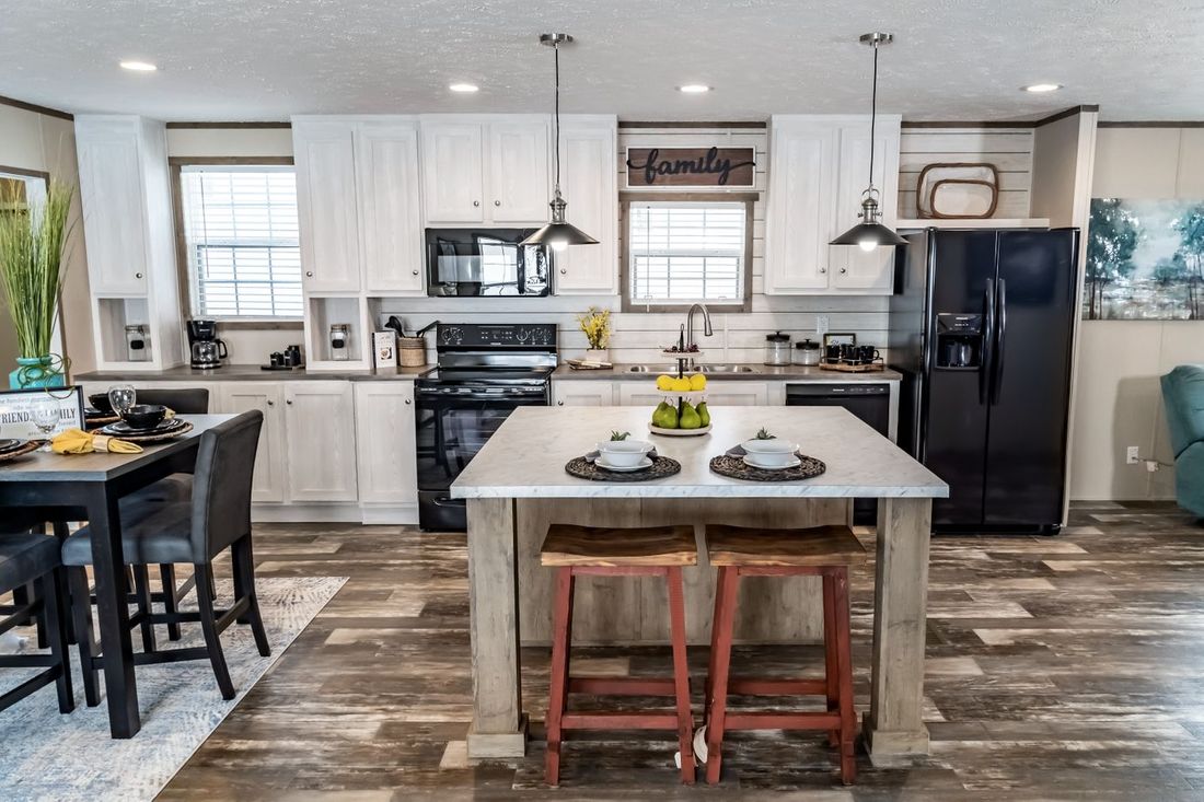 The ULTRA EXCEL 3 BR 28X56 Kitchen. This Manufactured Mobile Home features 3 bedrooms and 2 baths.