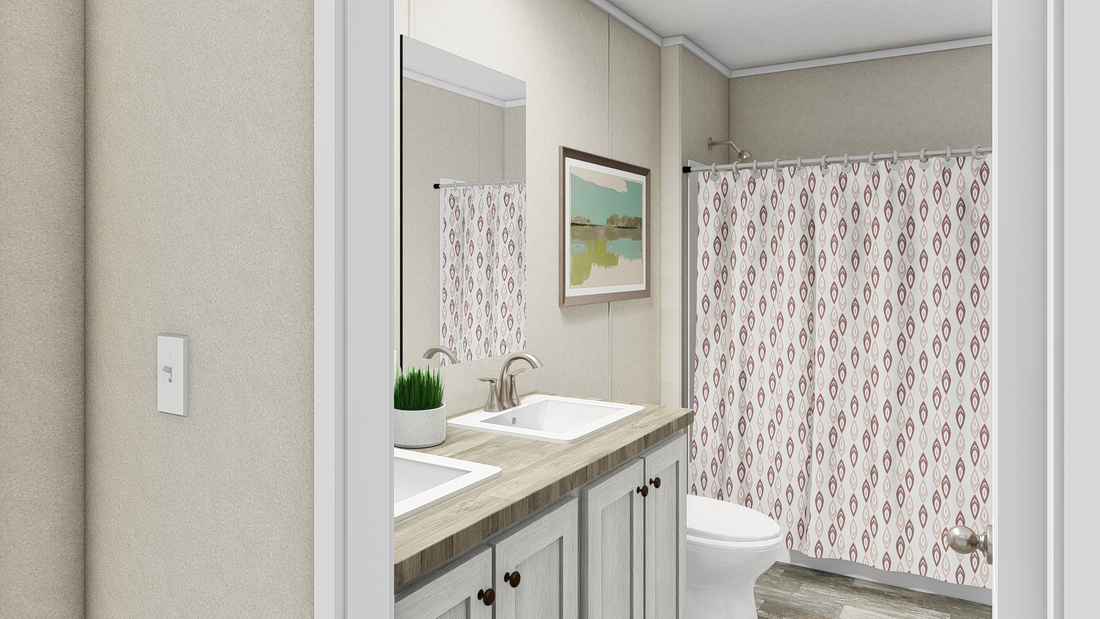 The ULTRA EXCEL BIG BOY 4 BR 32X76 Guest Bathroom. This Manufactured Mobile Home features 4 bedrooms and 2 baths.