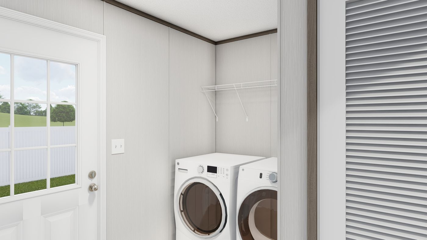 The LEGEND ANNIVERSARY 16X76 Utility Room. This Manufactured Mobile Home features 3 bedrooms and 2 baths.